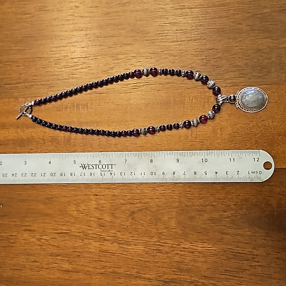 Hand-crafted amethyst and rutilated quartz beaded necklace